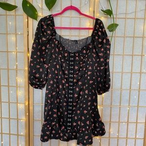 Long sleeve puff shoulder floral dress.